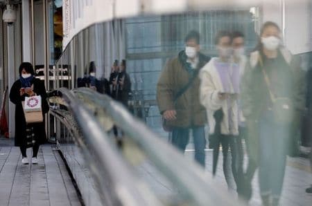 　内閣府が１５日発表した１０━１２月期国民所得統計１次速報によると、実質国内総生産（ＧＤＰ）は前期比プラス３．０％、年率換算でプラス１２．７％となった。東京都で２日撮影（２０２１年　ロイター/Kim Kyung-Hoon）