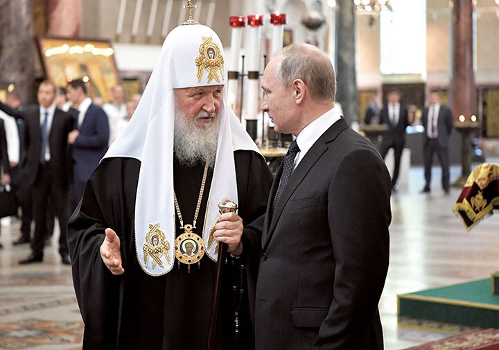 ロシア正教会のキリル総主教とプーチンはそれぞれの思惑で連携を深めている　Sputnik Photo Agency-REUTERS