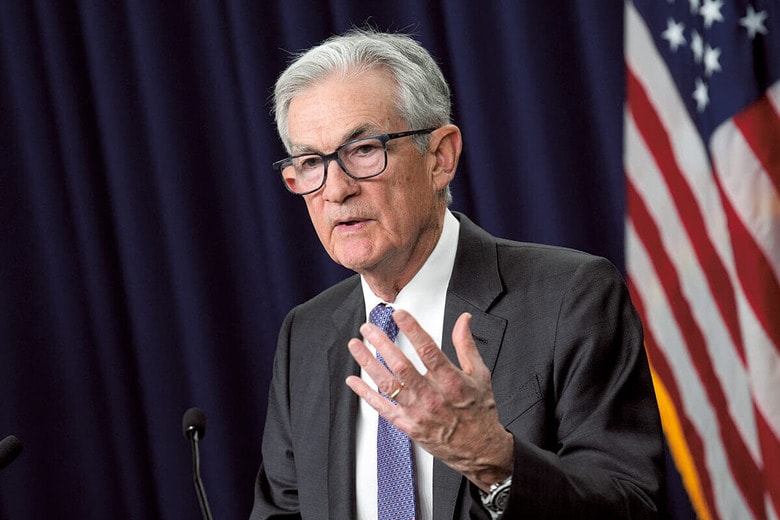 FOMC後の記者会見で説明するパウエル議長（12月10日）　YURI GRIPASｰABACAｰREUTERS