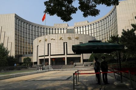 　１２月２２日　中国人民銀行（中央銀行）は２２日、２０２０年以降に発生した１万元（１４２０．４７ドル）までの延滞個人債務について、２６年３月３１日までに完済すれば信用記録から削除できるようにすると発表した。写真は中国人民銀行。２０２２年９月、北京で撮影（２０２５年　ロイター／Tingshu Wang）