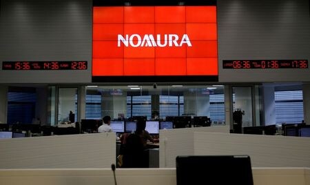 　５月１８日、野村ホールディングスは、米顧客関連取引に関連して、２０２２年３月期の第１・四半期に約６５０億円の損失を計上すると発表した。２０１６年１１月、東京都で撮影（２０２１年　ロイター/Toru Hanai）