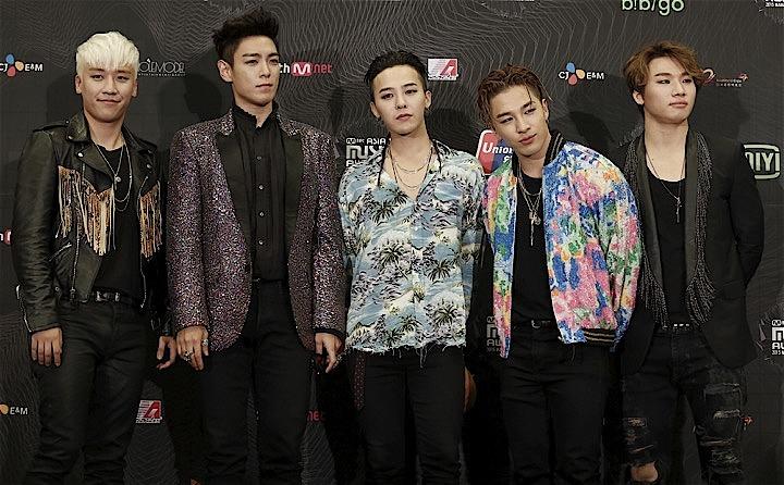 K-POPアイドルとして世界的に人気の高いBIGBANG。一連の事件で脱退したV.I（左）を除くメンバーは兵役についており活動休止中だ。Bobby Yip - REUTERS