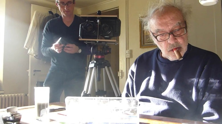 撮影監督としてゴダール（右）と共同作業を行うファブリス・アラーニョ（左）