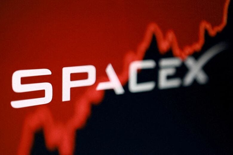 写真はスペースＸロゴと株価グラフのイメージ。6月5日撮影。REUTERS/Dado Ruvic