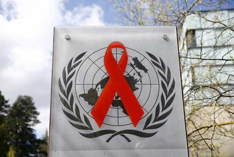 国連合同エイズ計画（ＵＮＡＩＤＳ）のロゴ。2021年4月、スイスのジュネーブで撮影。 REUTERS/Denis Balibouse