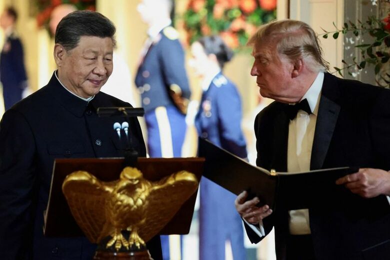 写真は米国のトランプ大統領と中国の習近平国家主席。2026年9月24日、ワシントンのホワイトハウスで行われた晩餐会で撮影。REUTERS/Evelyn Hockstein