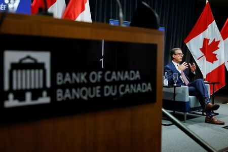 FILE PHOTO: Bank of Canada Governor Tiff Macklem takes part in an event at the Bank of Canada in Ottawa, Canada, October 7, 2021. REUTERS/Blair Gable/File Photo