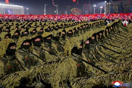 2月25日、平壌で行われた朝鮮労働党第9回大会を記念する軍事パレード。KCNA提供。