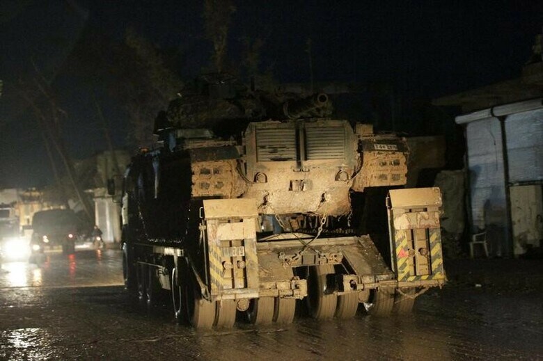 １２月２９日、ロシアのプーチン大統領は、シリアのアサド政権と反体制派勢力が停戦で合意したと発表。トルコの軍用車両。２７日撮影（２０１６年　ロイター／Khalil Ashawi）