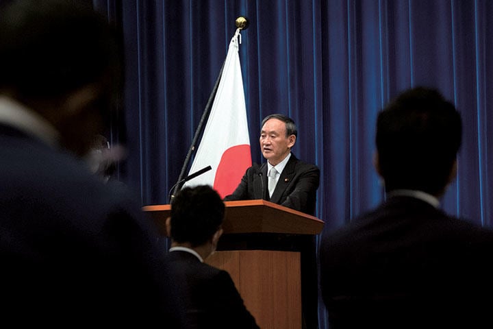 就任会見で菅は「規制改革を政権のど真ん中に置いている」と述べた　REUTERS