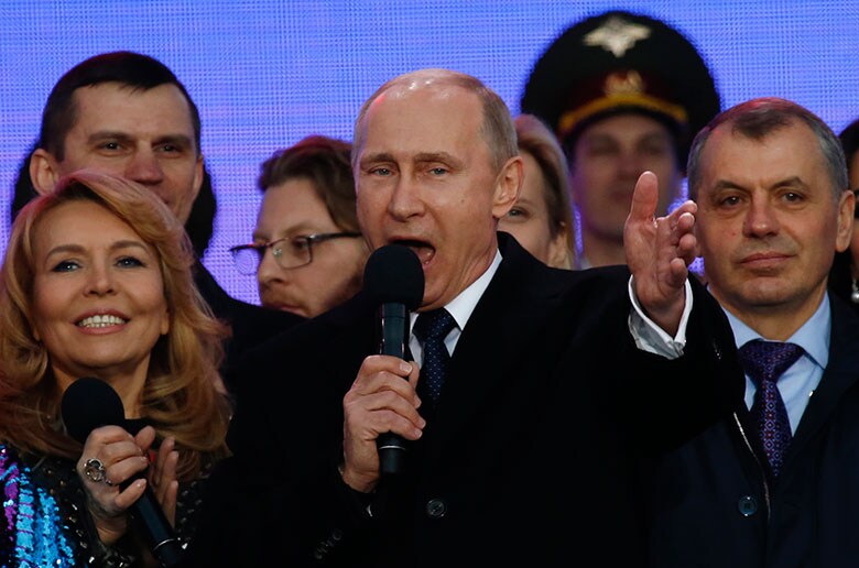 クリミアの「帰郷」1周年を祝うプーチン大統領（昨年3月18日）　Maxim Zmeyev-REUTERS