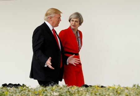 ７月１０日、英国のメイ首相は、今週訪英する予定のトランプ米大統領について、通商などの問題について前向きに協議することに期待感を表明した。ワシントンで２０１７年１月撮影（２０１８年　ロイター/Kevin Lamarque）