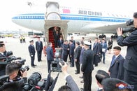 金正恩の「変化」が見える中国機の写真