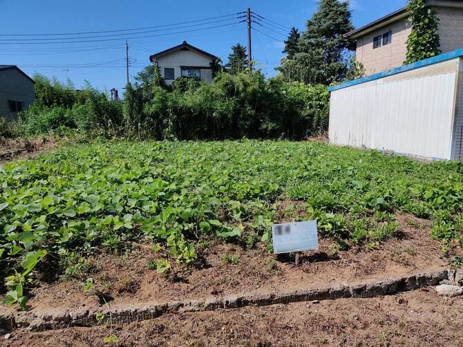 草刈り業者の立て看板