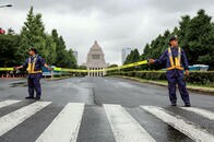 中国人女性と日本人の初老男性はホテルの客室階に消えていった