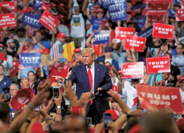 トランプの不法移民に対する強硬策は国民の半数以上に好意的に受け止められている　CARLOS BARRIAーREUTERS