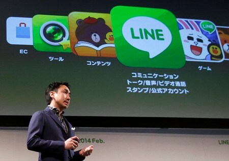 　１１月１８日、ＳＮＳサービスのＬＩＮＥとヤフーを傘下に持つＺホールディングス（ＨＤ）、経営統合について基本合意を締結することを決議したと発表した。写真はＬＩＮＥの出澤剛ＣＥＯ。２０１４年２月２６日、東京で撮影（２０１９年　ロイター/Yuya Shino）