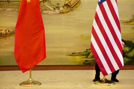 　１２月１４日、中国の台湾政策を担当する国務院台湾事務弁公室は、「一つの中国」原則に対するいかなる干渉や毀損（きそん）も台湾海峡における平和や安定に深刻な打撃をもたらすと警告した。写真は１月北京での代表撮影（２０１６年／ロイター）