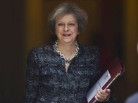 英メイ首相、法人税を引き下げへ　EU離脱による企業脱出の引き止め策
