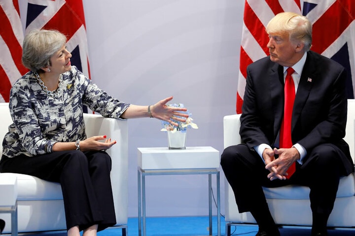 マクロ経済の指標でみれば英米両国の経済は決して悪くはないのに、なぜポピュリズムがこの両国で力を持ったのか（7月8日、G20にて）　Carlos Barria-REUTERS