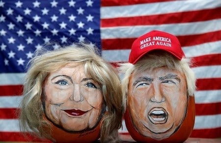 　６月１４日、ロイター／イプソスの世論調査によると、米大統領選でヒラリー・クリントン前国務長官の支持率は、実業家ドナルド・トランプ氏の支持率を１１．６ポイントリードしている。写真は両氏の似顔絵、８日撮影（２０１６年　ロイター/Jim Young）