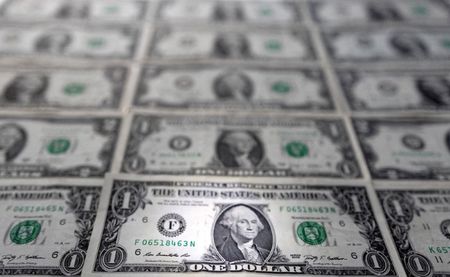 FILE PHOTO: U.S. dollar banknotes are displayed in this illustration taken, February 14, 2022. REUTERS/Dado Ruvic/File Photo