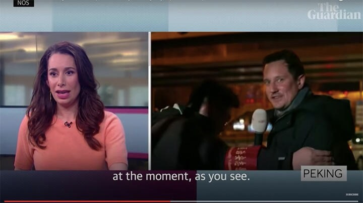 困惑するアナウンサー（左）と連れ去られる記者　Guardian Sport-YouTube