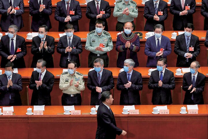 全人代の会場に姿を現した習近平（シー・チンピン）国家主席　CARLOS GARCIA RAWLINS-REUTERS