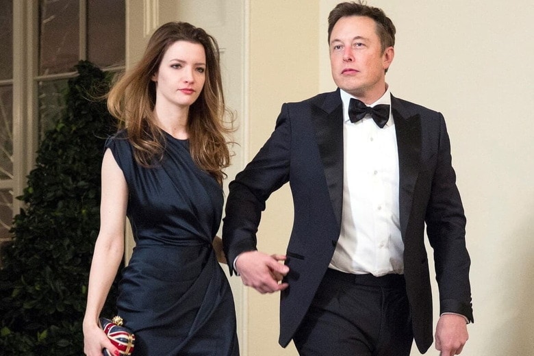 イーロン・マスクと当時の妻タルラ・ライリー（2014年2月）　Joshua Roberts-Reuters