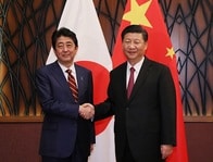 日中首脳会談、習近平はなぜ笑顔だったのか