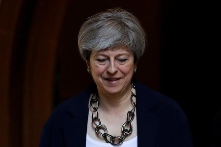 　６月１２日、メイ英首相（写真）の報道官は首相の欧州連合（ＥＵ）離脱（ブレグジット）計画に変更はないと表明した。１１日撮影（２０１７年　ロイター/Stefan Wermuth）