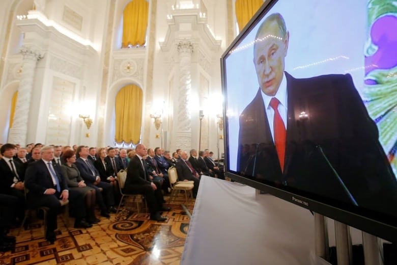 モスクワで演説するプーチン（2016年12月）　Maxim Shemetov-Reuters