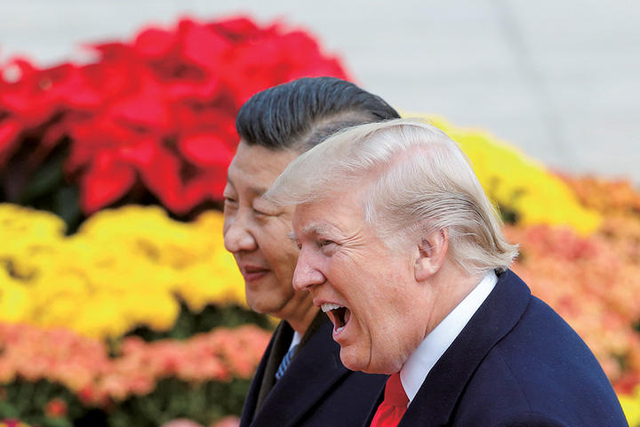 THOMAS PETER-REUTERS