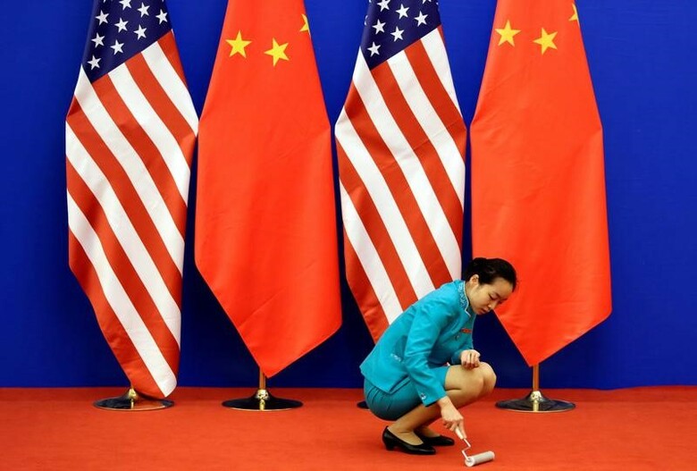 ４月１日、中国商務省の報道官は、トランプ米大統領が不公正貿易の是正に向けて新たに２つの大統領令に署名したことを受け、米国に対し、国際貿易ルールの順守と協力および対話の改善を求めた。２０１４年に北京で行われた米中戦略・経済対話の開場で撮影（２０１７年　ロイター／Jason Lee）