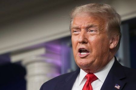 　８月３日、トランプ米大統領は、ニューヨーク州マンハッタン地検が同日、トランプ氏の財務記録を連邦大陪審に提出するよう求めた召喚状の範囲にトランプ・オーガニゼーションも含めると言及したことについて、魔女狩りの一環だと批判した。ホワイトハウスで撮影（２０２０年　ロイター/Jonathan Ernst）