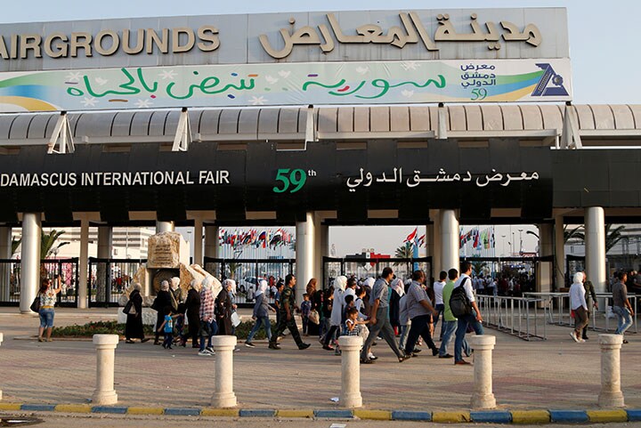 内戦勃発後、初めて開催されたダマスカス国際見本市は多くの入場者を集めた　Omar Sanadiki-REUTERS
