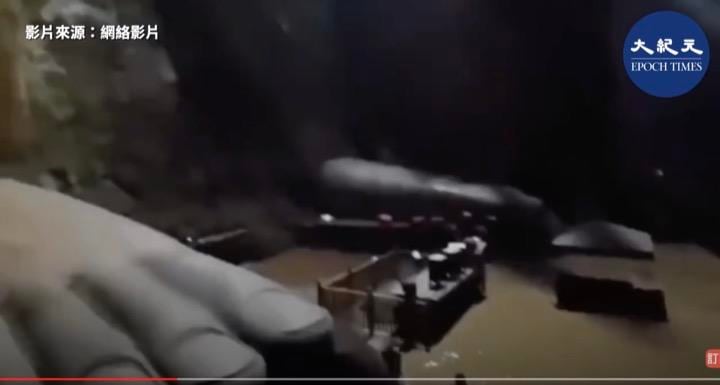 中国・長江流域で豪雨による洪水が発生し、10万人が避難する事態となっている。写真は洪水が足元に迫る楽山大仏　香港大紀元新唐人聯合新聞頻道 / YouTube