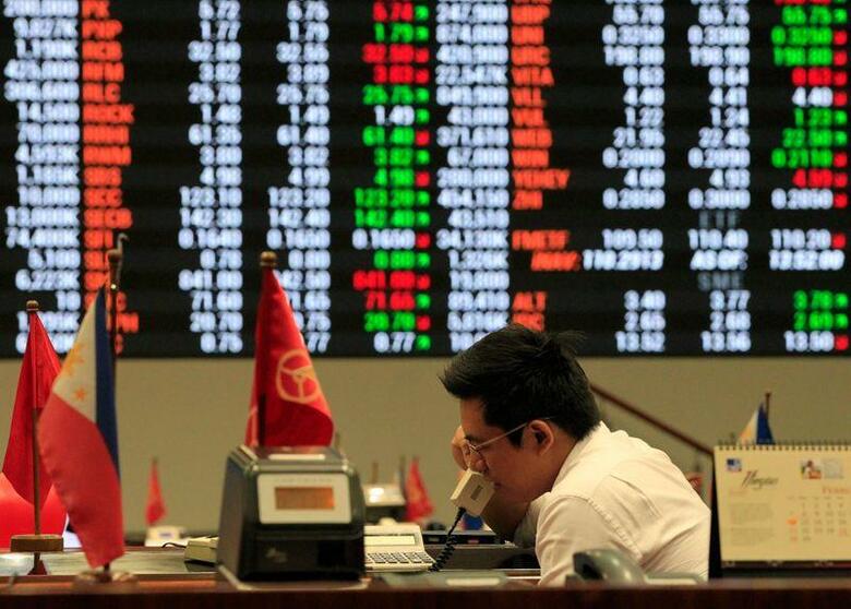 フィリピン証券取引所は、新型コロナウイルスの感染拡大を受け、トレーダーや従業員の安全確保のため、取引を無期限で停止した。写真はマニラで2016年2月撮影（2020年　ロイター／Romeo Ranoco）
