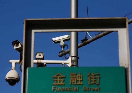 民間企業の債務不履行が増加するなか、中国当局は企業が債務不履行に陥った際の対策を強化する。上海証券報が２５日に報じた。写真は北京中心部の金融街。２０１４年１１月撮影（２０１９年　ロイター/Kim Kyung-Hoon）