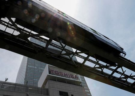 　６月１５日、梶山弘志経済産業相は、国の安全確保が損なわれる恐れがある場合には、関係する個別企業への対応を行うこともある、と述べた。都内で１１日撮影（２０２１年　ロイター／Issei Kato）