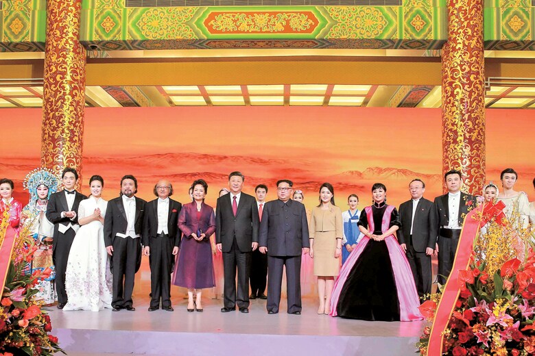 非公式訪問でも盛大な晩餐会が催されるなど、金正恩は国賓級のもてなしを受けた　KCNA-REUTERS