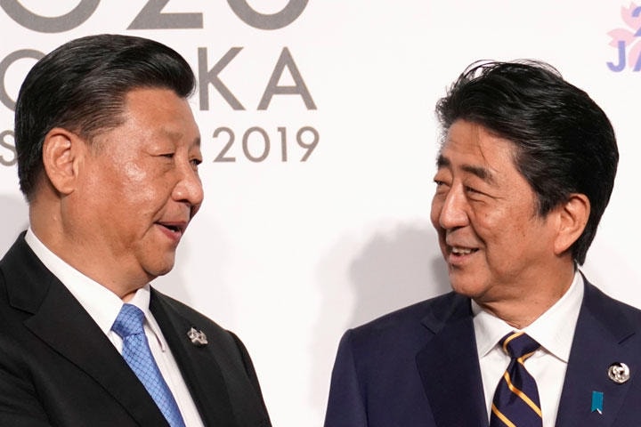 G20大阪サミットにおける安倍首相と習近平国家主席　Kevin Lamarque-REUTERS