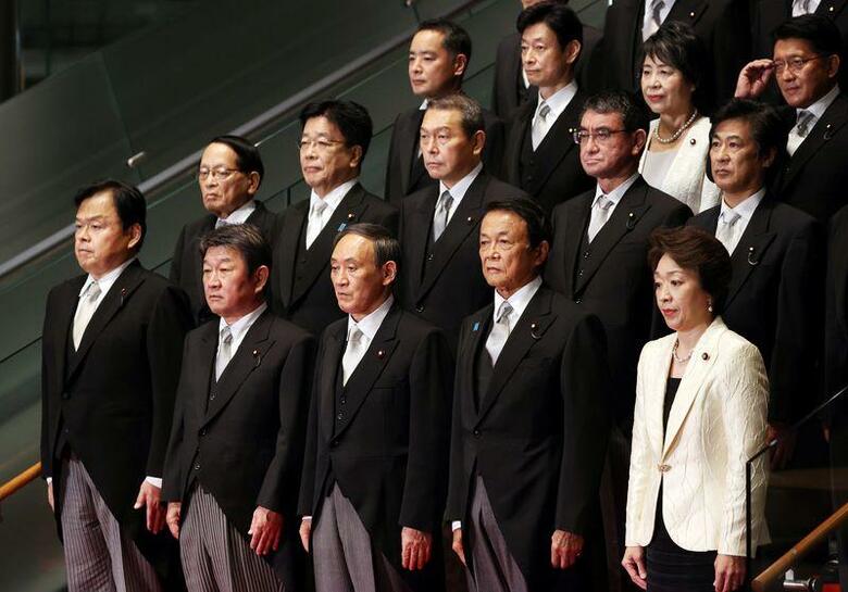 菅義偉首相の誕生が濃厚になり始めた９月上旬、株式市場は早くも「スガノミクス」銘柄を物色し始めた。注目を集めた１つが、ＳＢＩホールディングスだ。１６日撮影（２０２０年　ロイター/Yoshikazu Tsuno/Pool via REUTERS）