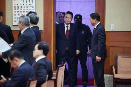 １月２１日、    韓国の尹錫悦大統領は憲法裁判所の審理に出席した＝代表撮影（２０２５年　ロイター）