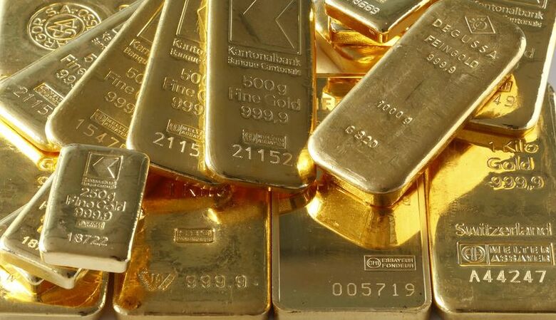 銀行の金庫に保管されている金塊。2014年11月20日にチューリッヒで撮影。 REUTERS/Arnd Wiegmann