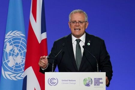 オーストラリアのモリソン首相は１０日、低炭素化技術を開発する企業への投資向けに１０億豪ドル（７億４０００万米ドル）の基金を設立すると発表した。写真はCOP26で演説する同首相、１日、代表撮影（２０２１年　ロイター）
