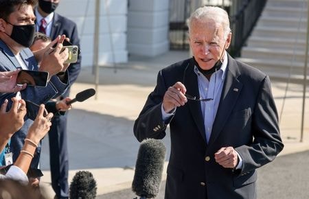 U.S. President Joe Biden speaks to reporters before departing the White House in Washington, to survey storm damage from Hurricane Ida in New York and New Jersey, U.S., September 7, 2021. REUTERS/Evelyn Hockstein - RC2LKP9ANQAL