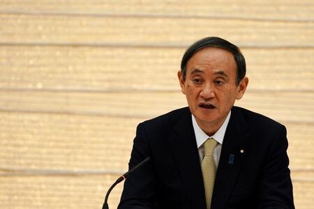 Japanese Prime Minister Yoshihide Suga, announces a state of emergency for Tokyo and three other prefectures during the government task force meeting for the COVID-19 measures at the prime minister\'s office in Tokyo, Japan April 23, 2021. Eugene Hoshiko/P