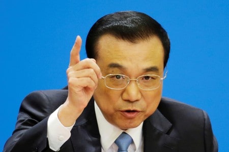 　４月９日、中国の李克強首相は、一国主義の下での貿易戦争は、二国間の利益だけでなく世界共通の利益を損なうとの見解を示した。写真は北京で３月撮影（２０１８年　ロイター/Jason Lee）