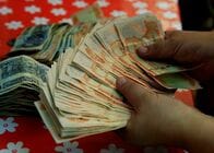 ボリビアがドルペッグ制廃止、経済の安定回復へ政策転換